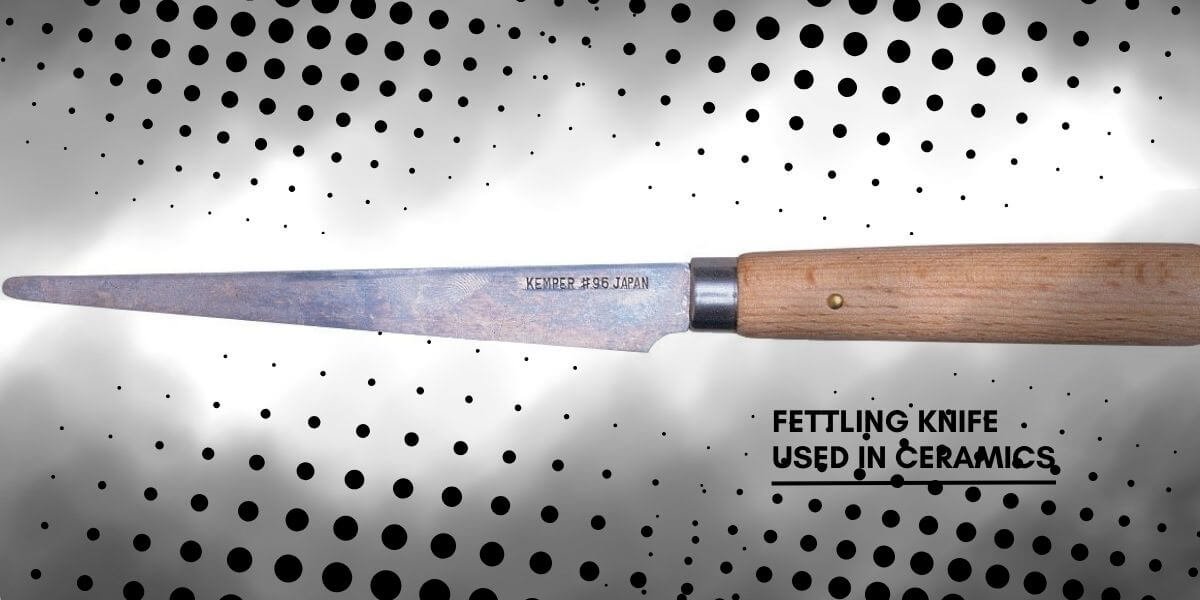 Fettling knife for ceramics with wooden handle