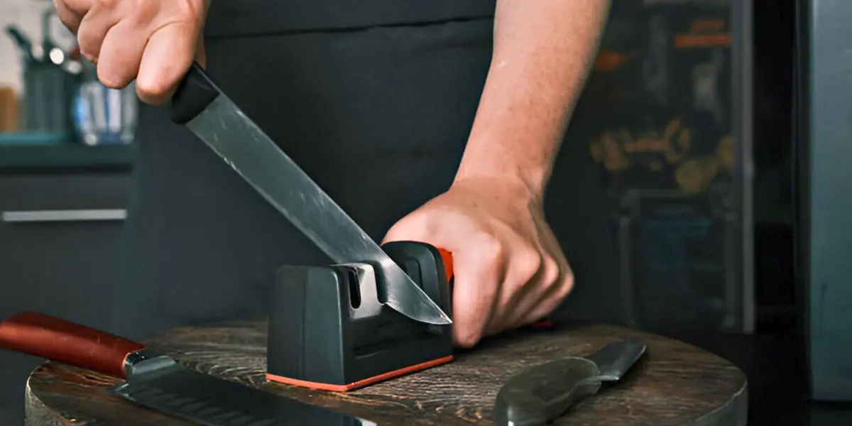 Chef’s Choice 3-stage knife sharpener in use